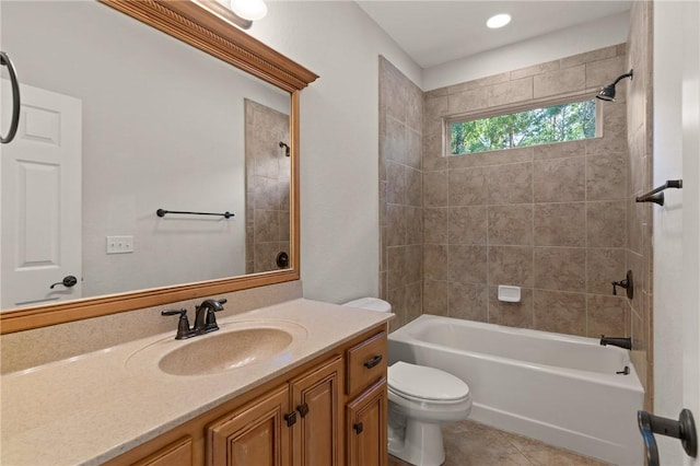 bathroom with toilet, shower / bathtub combination, tile patterned flooring, and vanity