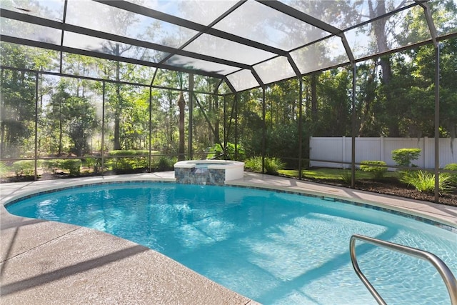 view of swimming pool with a pool with connected hot tub, glass enclosure, and fence