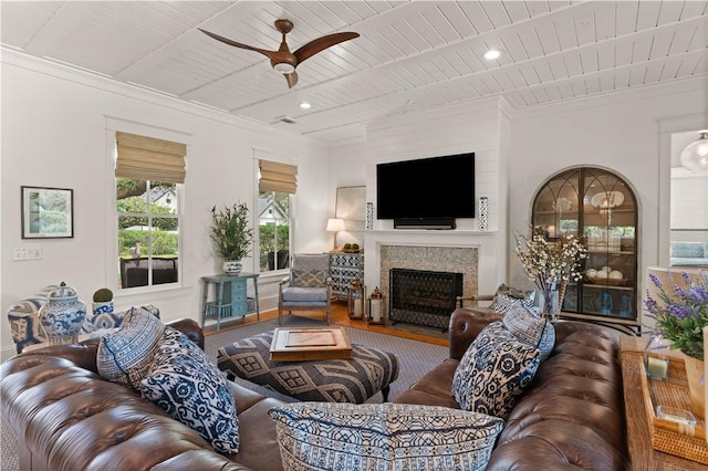 living room with ceiling fan, wooden ceiling, and hardwood / wood-style flooring