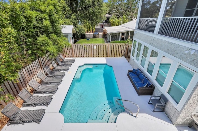 view of pool featuring a patio area