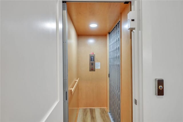 hall featuring light hardwood / wood-style floors