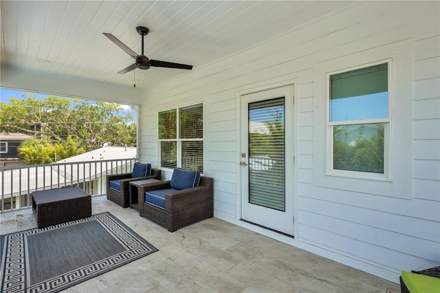 view of patio with a porch and ceiling fan