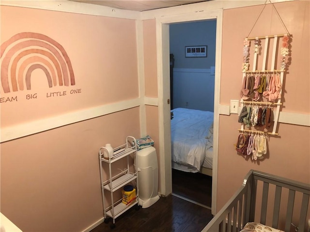 6644 New Jesup Hwy, Brunswick, GA 31523 - bedroom with dark wood-style flooring