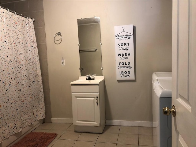 6644 New Jesup Hwy, Brunswick, GA 31523 - bathroom featuring tile patterned flooring, vanity, curtained shower, and independent washer and dryer