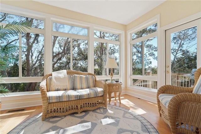 sunroom featuring visible vents