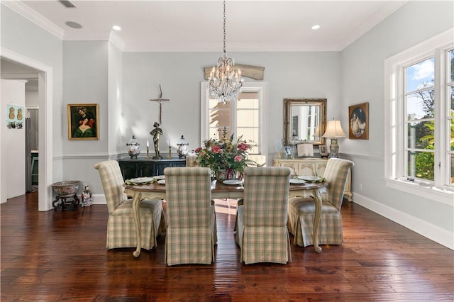 dining space featuring a notable chandelier, a healthy amount of sunlight, ornamental molding, and dark wood-type flooring