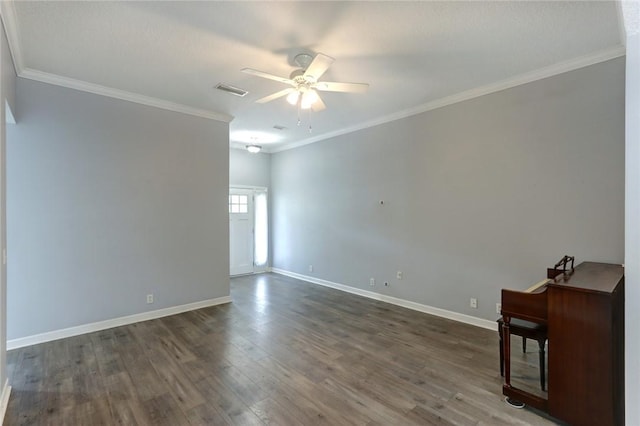 30 Bridgewater Way, Brunswick, GA 31525 - unfurnished room with a ceiling fan, baseboards, dark wood-type flooring, and crown molding