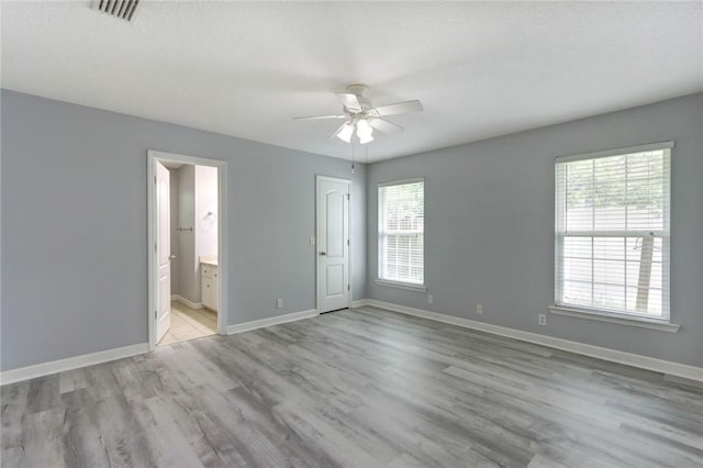 30 Bridgewater Way, Brunswick, GA 31525 - empty room featuring ceiling fan, light wood finished floors, and baseboards