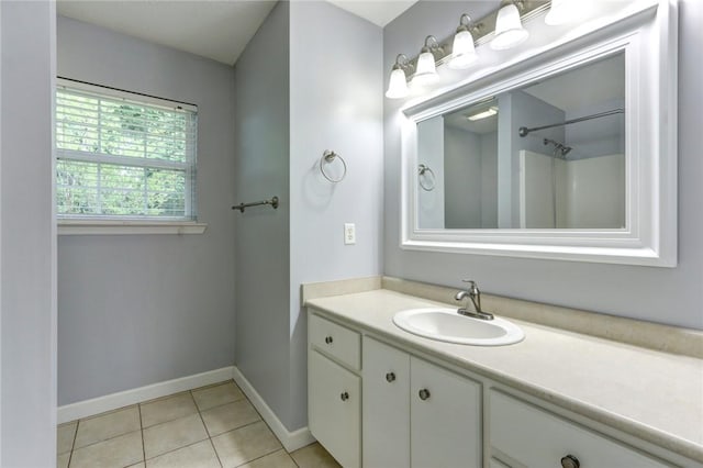 30 Bridgewater Way, Brunswick, GA 31525 - bathroom featuring baseboards, vanity, and tile patterned flooring