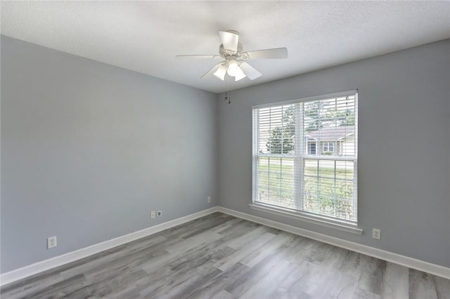 30 Bridgewater Way, Brunswick, GA 31525 - unfurnished room featuring wood finished floors, baseboards, and ceiling fan