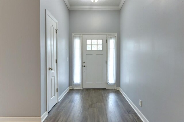 30 Bridgewater Way, Brunswick, GA 31525 - foyer with crown molding, dark wood-style flooring, and baseboards