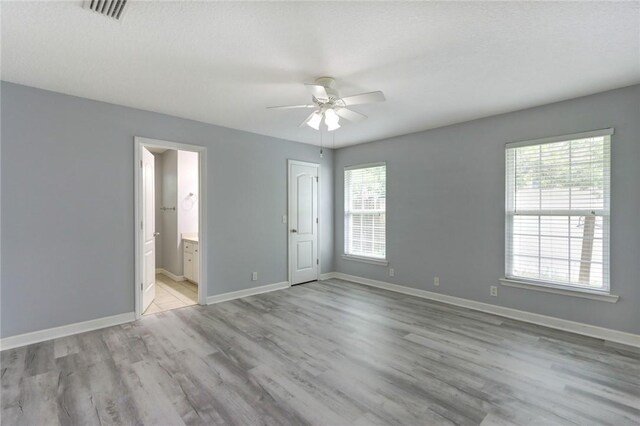 30 Bridgewater Way, Brunswick, GA 31525 - empty room featuring ceiling fan, light wood finished floors, and baseboards