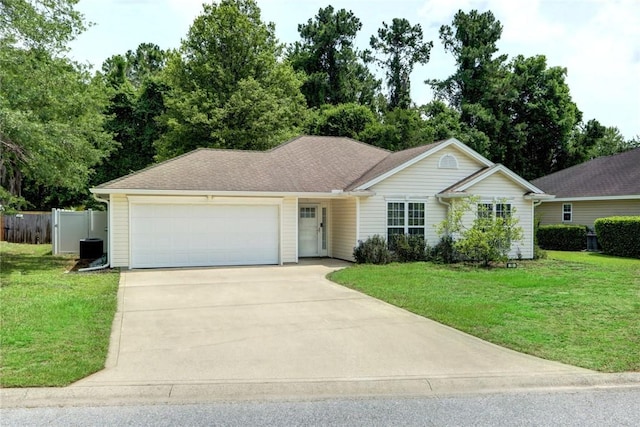 30 Bridgewater Way, Brunswick, GA 31525 - ranch-style house with driveway, an attached garage, and central AC unit
