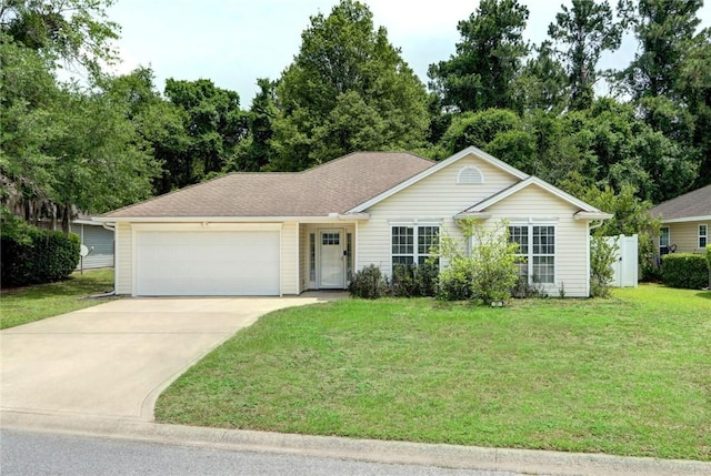 30 Bridgewater Way, Brunswick, GA 31525 - ranch-style home with a garage, driveway, and a front yard