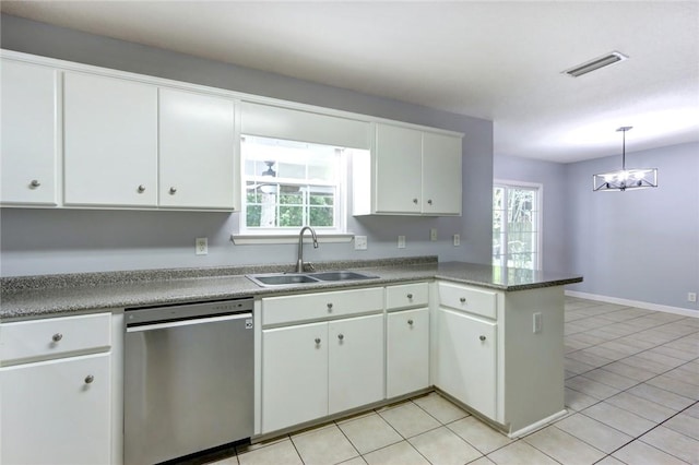 30 Bridgewater Way, Brunswick, GA 31525 - kitchen with dishwasher, a sink, a peninsula, and plenty of natural light