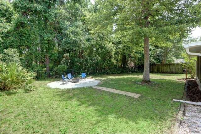 30 Bridgewater Way, Brunswick, GA 31525 - view of yard featuring a fire pit and a patio area