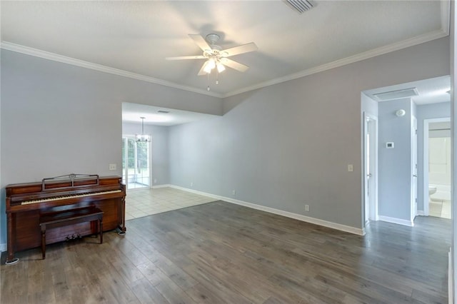 30 Bridgewater Way, Brunswick, GA 31525 - living area featuring wood finished floors, ceiling fan, crown molding, baseboards, and a chandelier