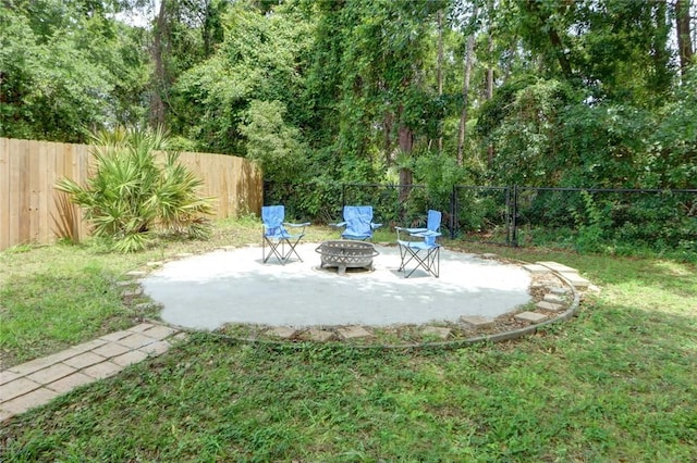 30 Bridgewater Way, Brunswick, GA 31525 - view of yard with a patio area and an outdoor fire pit