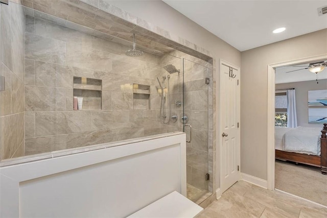 full bathroom with a ceiling fan, baseboards, visible vents, a stall shower, and connected bathroom