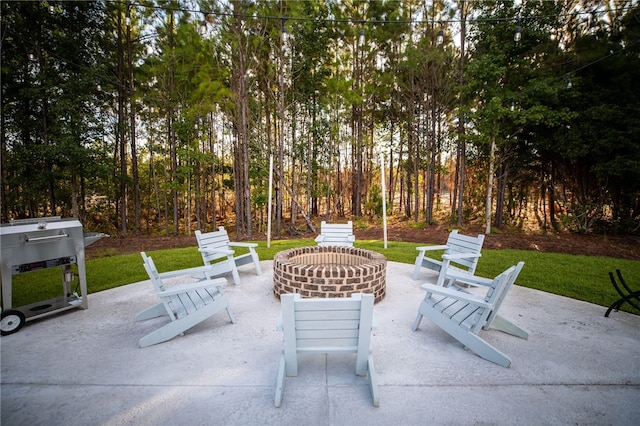 188 Allie Loop, Brunswick, GA 31525 - view of patio / terrace featuring a fire pit