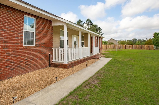 5604 Woodstone Dr, Blackshear, GA 31516 - view of yard with a porch and fence