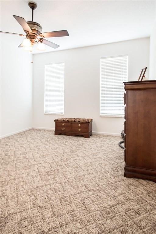 5604 Woodstone Dr, Blackshear, GA 31516 - unfurnished bedroom featuring carpet flooring, baseboards, and a ceiling fan