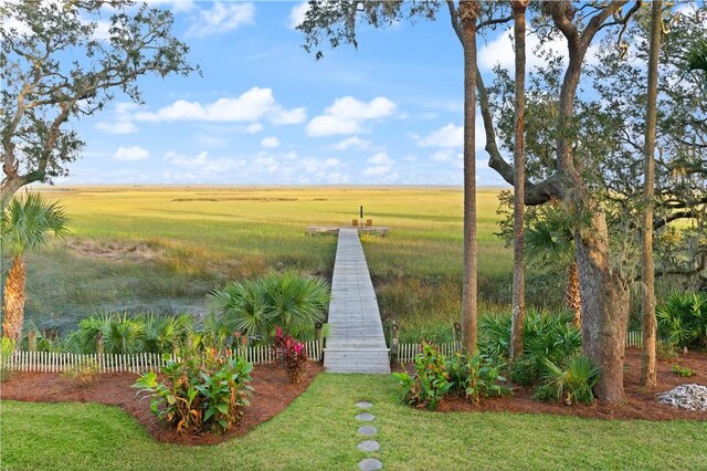 view of yard with a rural view