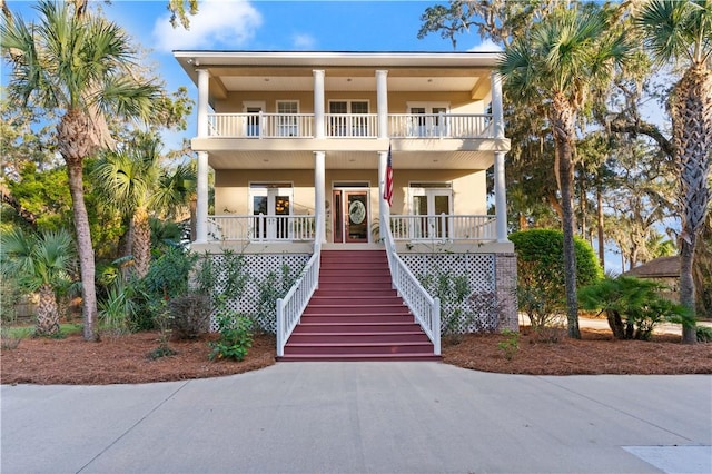 coastal inspired home with covered porch