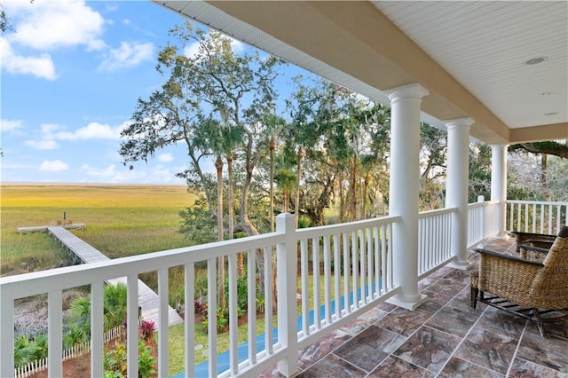 balcony featuring a rural view