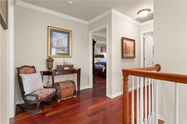 hallway featuring dark hardwood / wood-style floors and ornamental molding