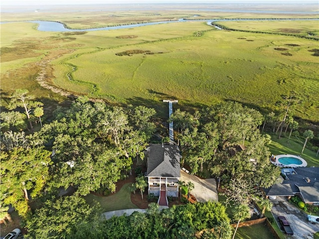 birds eye view of property with a rural view