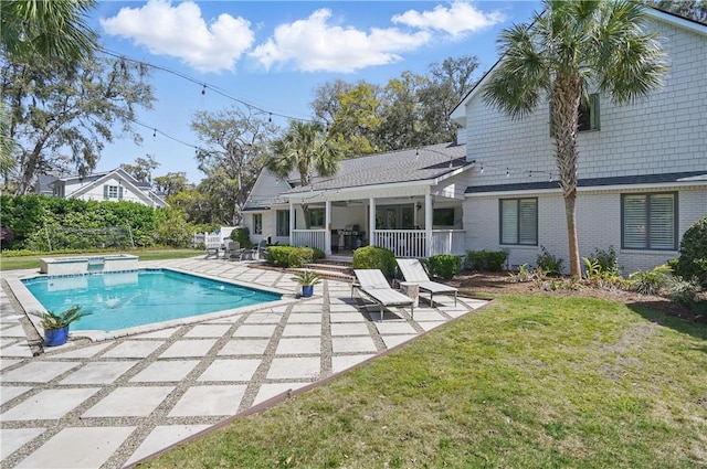 184 Merion, Saint Simons Island, GA 31522 - outdoor pool with a patio, an in-ground hot tub, and a lawn