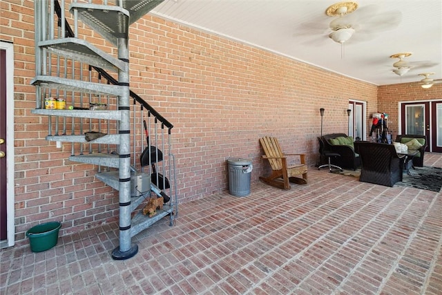 view of patio featuring ceiling fan