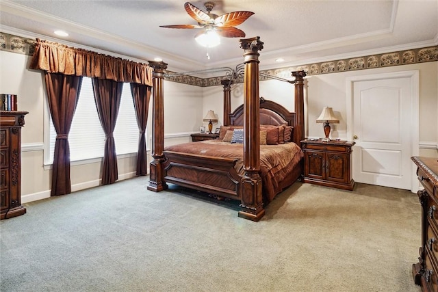 bedroom with light carpet, crown molding, and ceiling fan