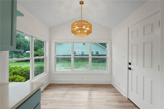 98 Atlantic Dr, Saint Simons Island, GA 31522 - unfurnished sunroom with a chandelier and lofted ceiling