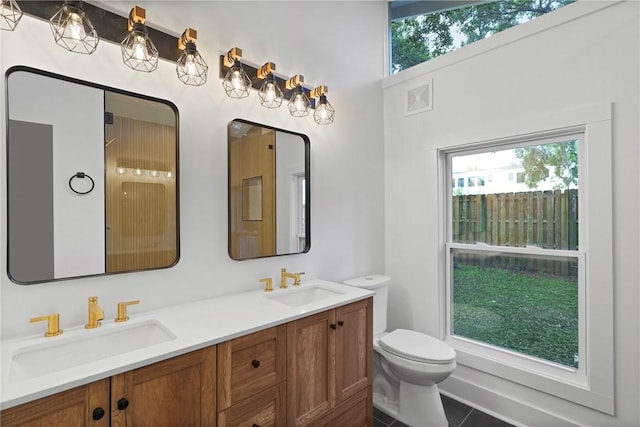 98 Atlantic Dr, Saint Simons Island, GA 31522 - bathroom with double vanity and tile patterned flooring