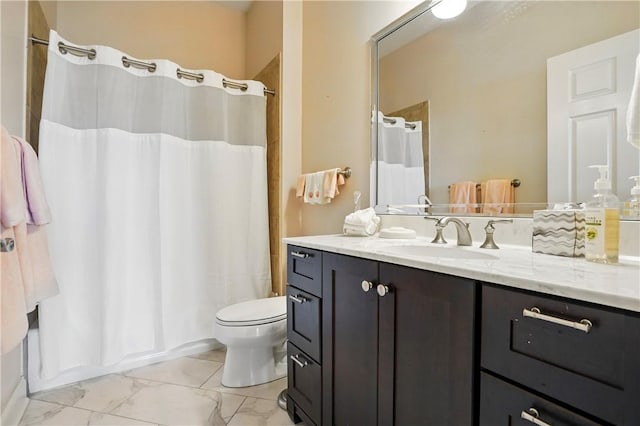 2306 Grand View Dr, Saint Simons Island, GA 31522 - full bath with vanity, toilet, marble finish floors, and shower / tub combo