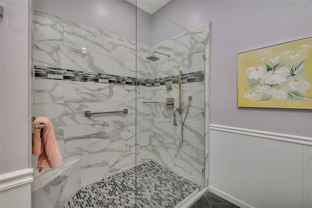 2306 Grand View Dr, Saint Simons Island, GA 31522 - full bathroom featuring a marble finish shower and wainscoting