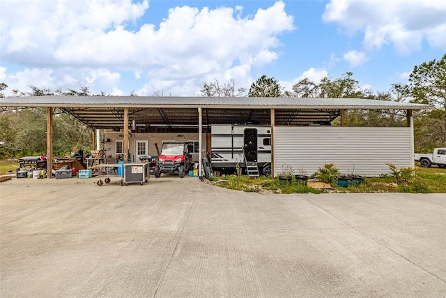 view of parking with a carport