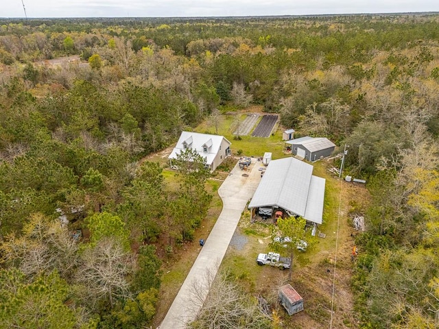 aerial view with a wooded view