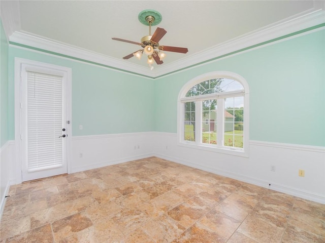 unfurnished room with crown molding and ceiling fan