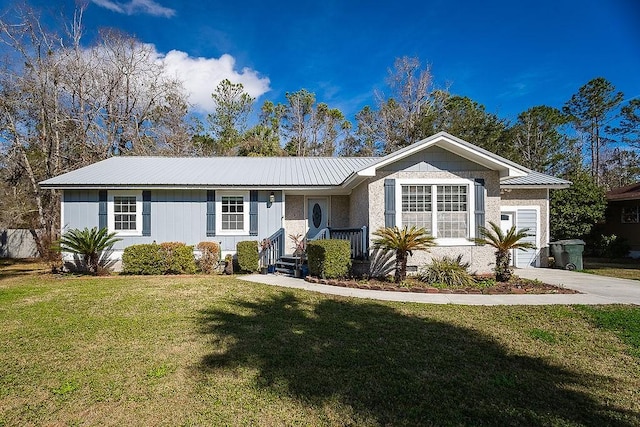 single story home with a front lawn and a garage