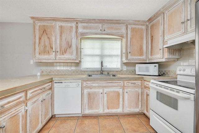 3429 US Highway 82, Brunswick, GA 31523 - kitchen featuring white appliances, a sink, light brown cabinetry, and light countertops