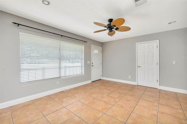 3429 US Highway 82, Brunswick, GA 31523 - unfurnished room with ceiling fan, baseboards, and light tile patterned floors