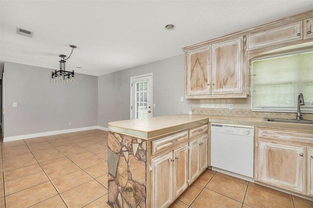 3429 US Highway 82, Brunswick, GA 31523 - kitchen featuring white dishwasher, light brown cabinets, light tile patterned floors, a sink, and recessed lighting