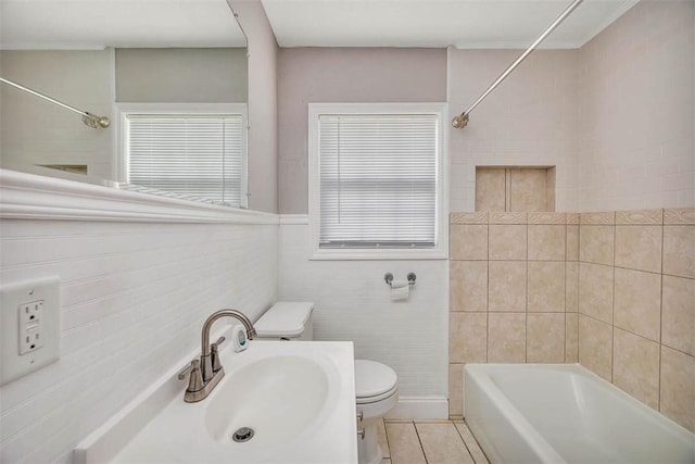 3429 US Highway 82, Brunswick, GA 31523 - bathroom featuring toilet, shower / bath combination, tile patterned flooring, tile walls, and vanity
