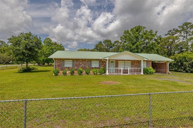 3429 US Highway 82, Brunswick, GA 31523 - ranch-style house with covered porch, brick siding, and metal roof