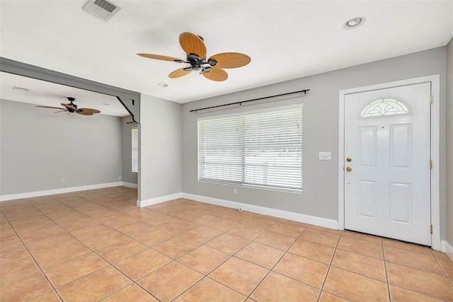 3429 US Highway 82, Brunswick, GA 31523 - entrance foyer with ceiling fan, light tile patterned floors, and baseboards