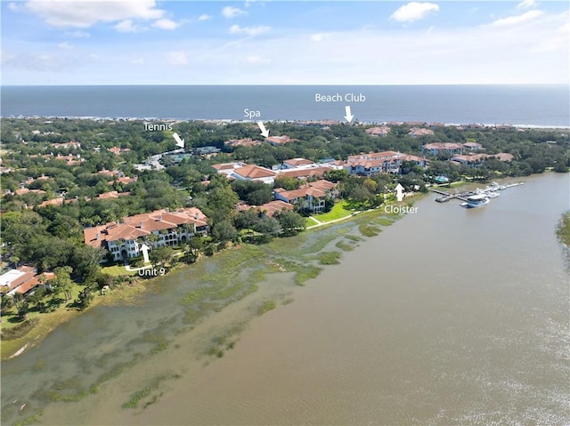 birds eye view of property featuring a water view