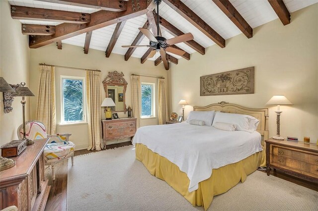 bedroom featuring lofted ceiling with beams, ceiling fan, and wood-type flooring